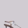 Azaela metallic sandalen met knopen en hak