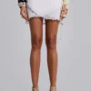 Calyptra mini-rok van chiffon met kralenrand