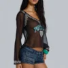 Chiffon top met voetbalversiering