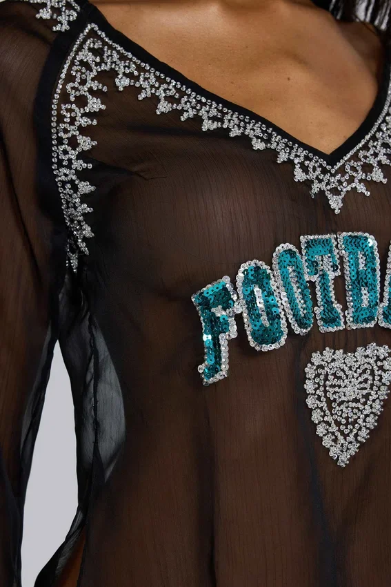 Chiffon top met voetbalversiering