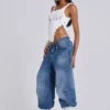Colossus Jeans met studs in middenblauwe wassing