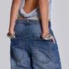Colossus Jeans met studs in middenblauwe wassing