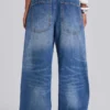 Colossus Jeans met studs in middenblauwe wassing