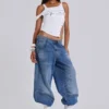 Colossus Jeans met studs in middenblauwe wassing