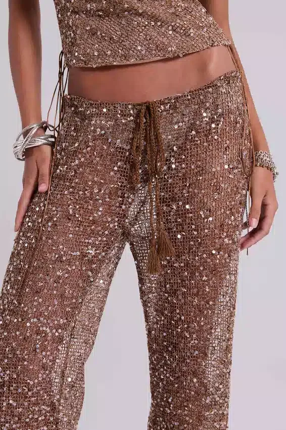 Deva broek van gebreide stof met pailletten in zandkleur