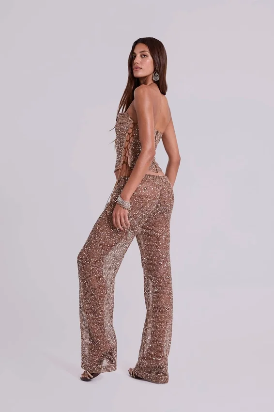 Deva broek van gebreide stof met pailletten in zandkleur