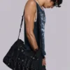 Drummer gecoate denim schoudertas