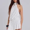 Enya mini-jurk met open rug in stippenmotief