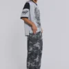 Gewassen zwarte cargo-broek met Trooper-camouflagepatroon