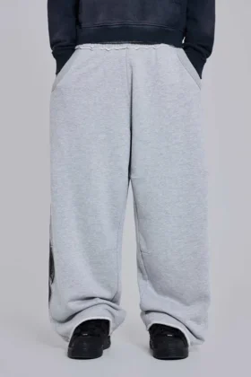 Grijs gemêleerde baggy Monster Joggers met gotische print
