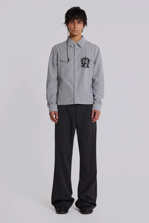 Grijze gestapelde bootcut-pakbroek
