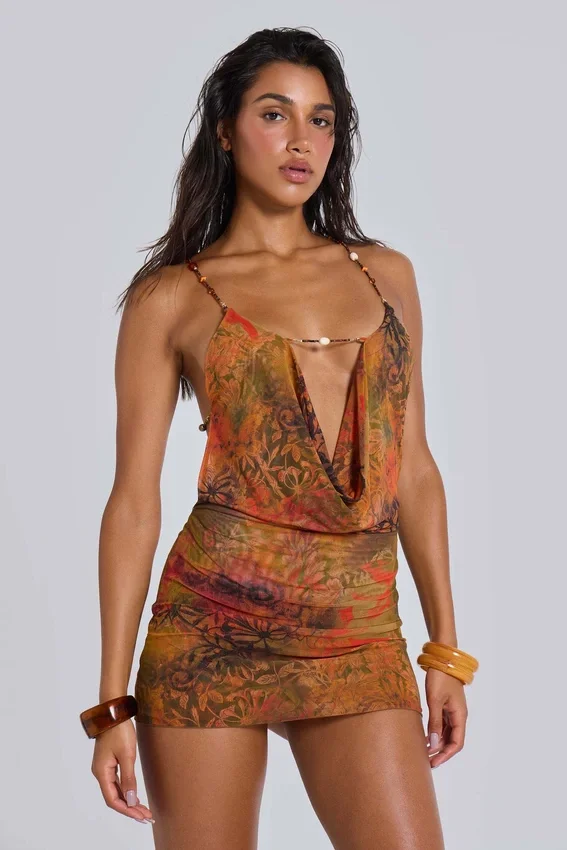 Hina mini-jurk met open rug en kralenversieringen