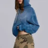 Hoodie met studs in sunfade-wafelstof