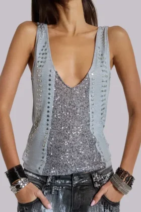 Kate vesttop met studs en diep decolleté