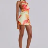 Lucia mini-jurk met open rug en bloemendetail