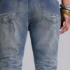Middenblauwe, verweerde, gekreukelde Drift-flared Jeans