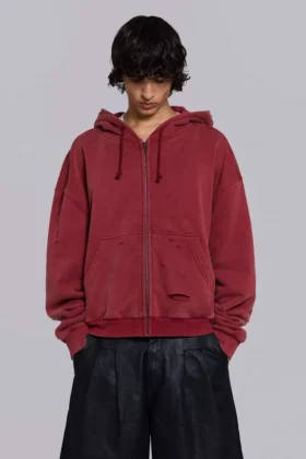 Rode, door de zon verbleekte hoodie met rits en wafelvoering