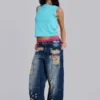 Tattered Colossus Jeans