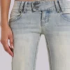 Thirteen-Jeans in lichte wassing