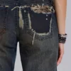 Tori versleten kanten bootcut-Jeans met lage taille