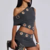 Zarco asymmetrische mini-jurk met oogjes